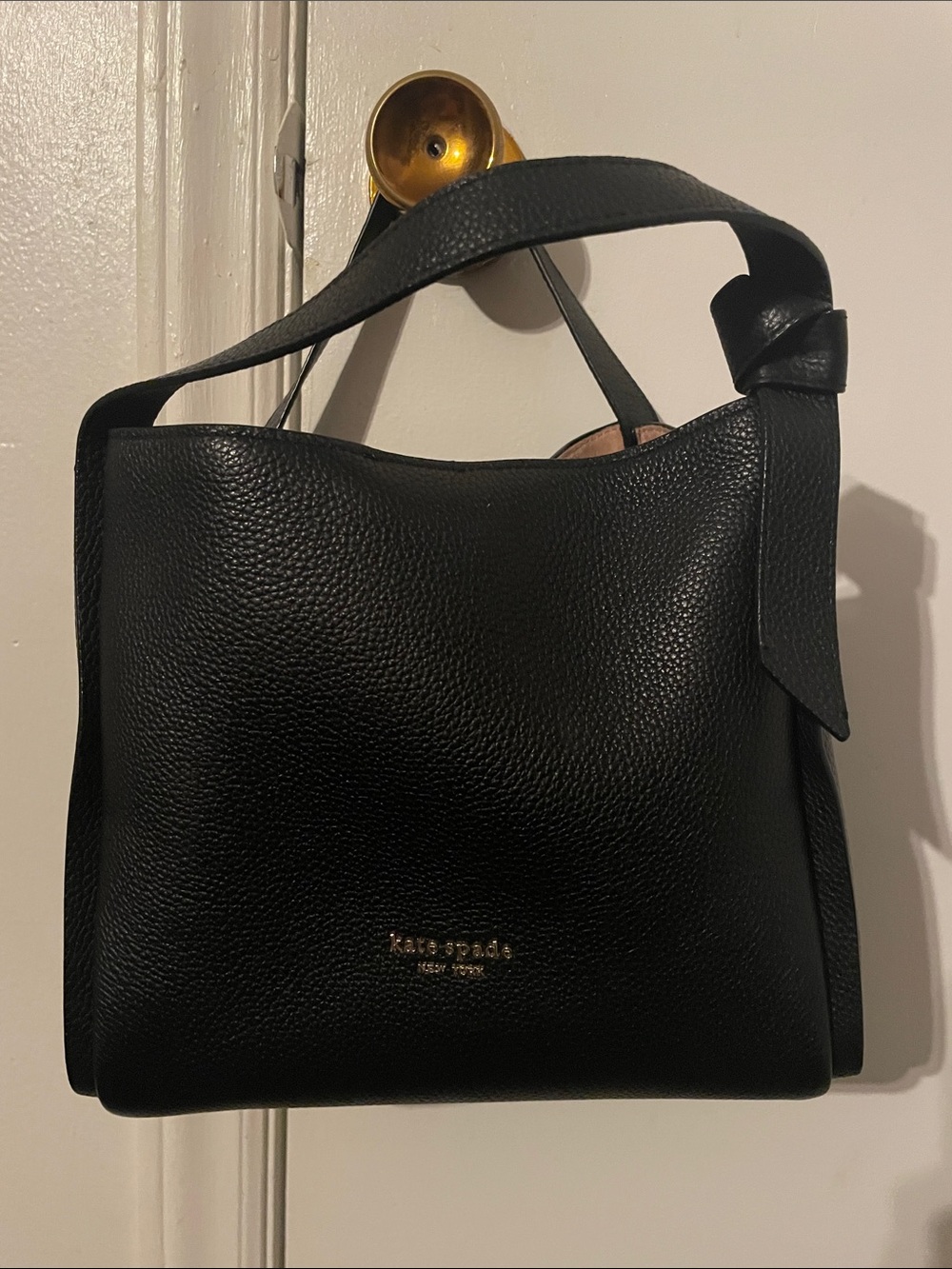 kate spade black pebbled leather shoulder bag with knot strap